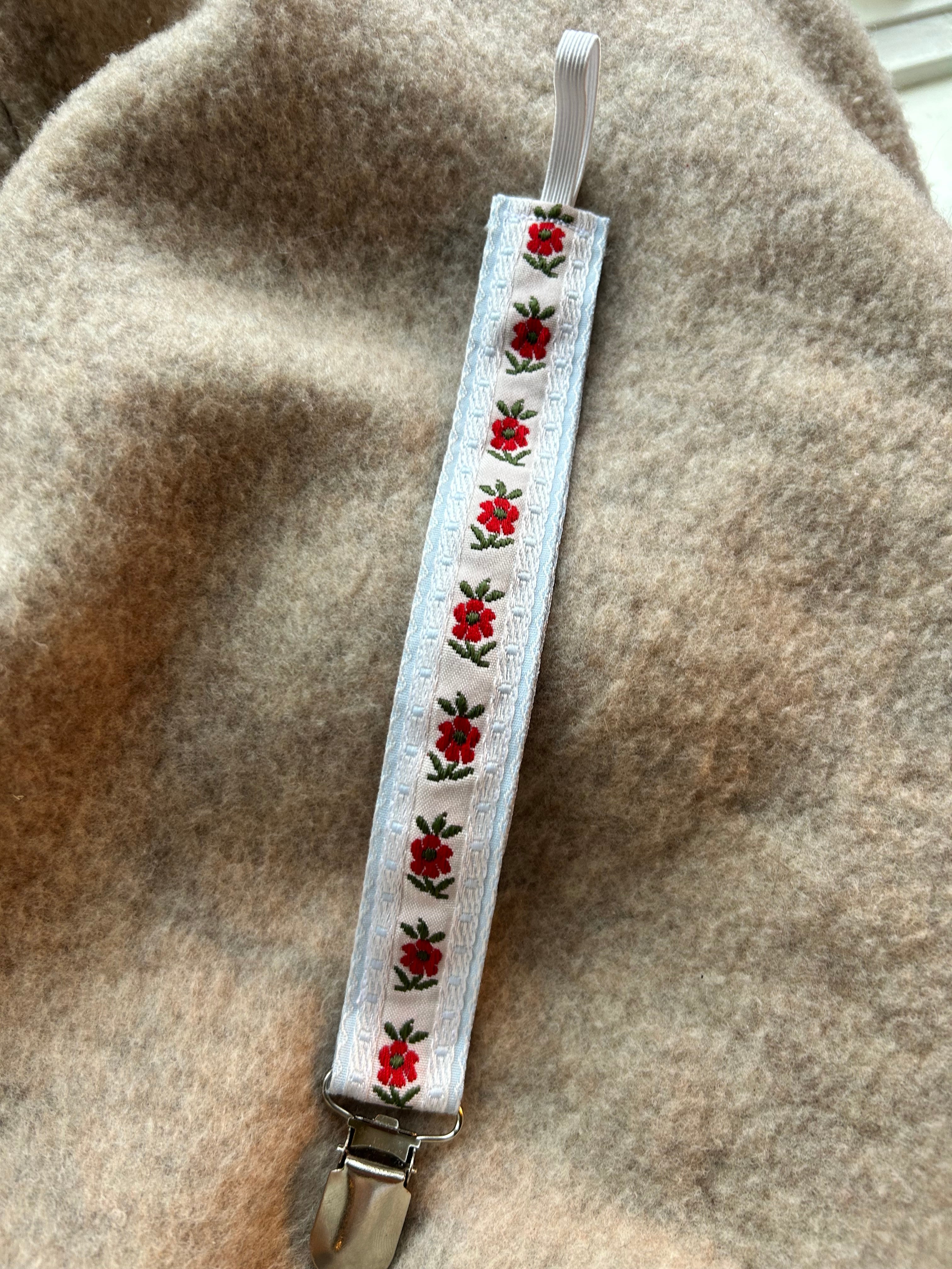 Crimson breeze - pacifier clip